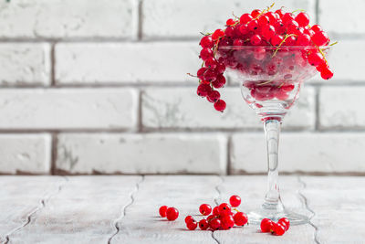 Close-up of red berries on table