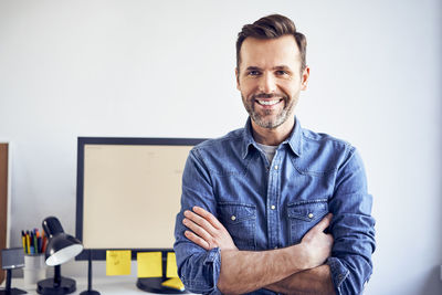 Portrait of smiling man in office