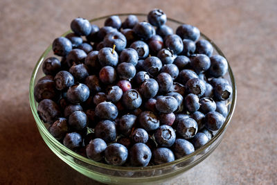 High angle view of fruits in container on table