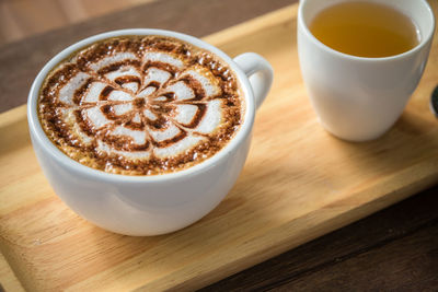 High angle view of cappuccino on table