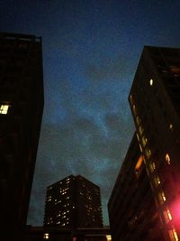 Low angle view of building against sky at night