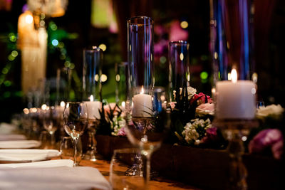 Luxury table settings for fine dining with and glassware, beautiful blurred background. 