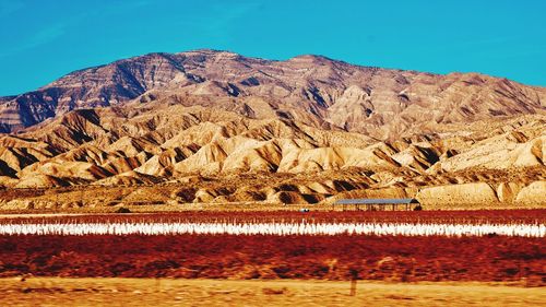 Scenic view of mountains against clear sky