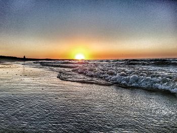 Scenic view of sea against sky during sunset