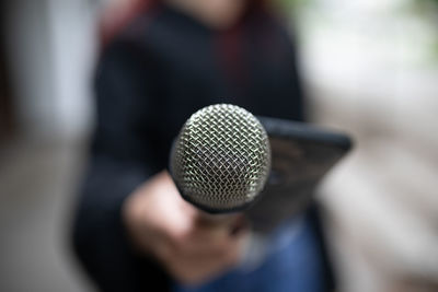 Close-up of man using mobile phone