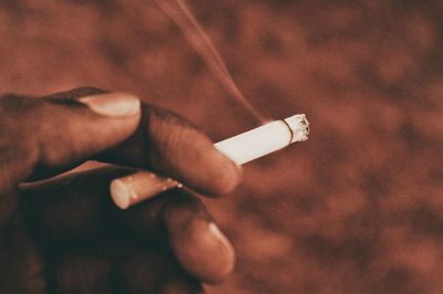 Close-up of woman smoking cigarette