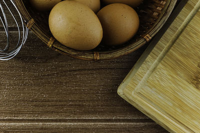 High angle view of fruits in basket on table