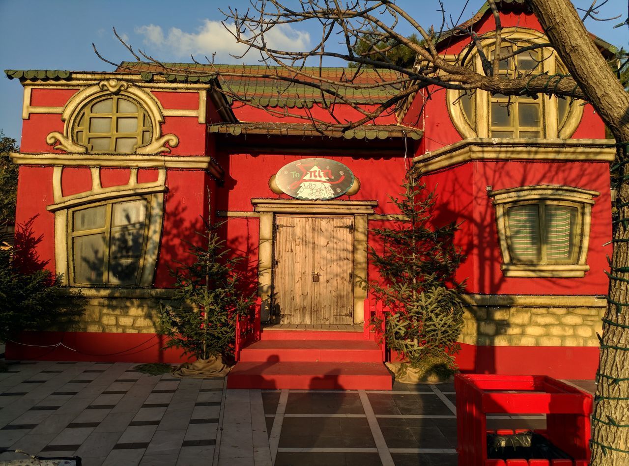 ENTRANCE OF BUILDING WITH RED TEMPLE