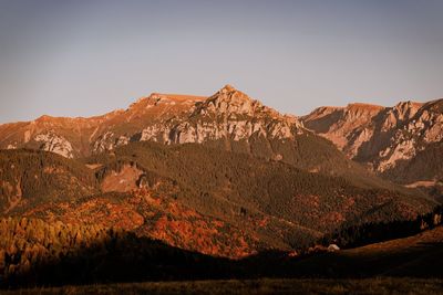 Scenic view of rocky mountains against clear sky