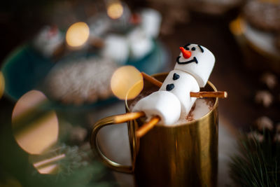 Close-up of figurine on table