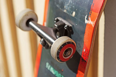 Skateboard leaning against house wall