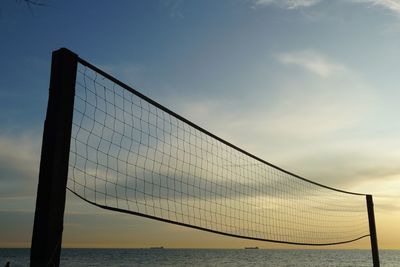 Close up of beach volleyball against blue sky