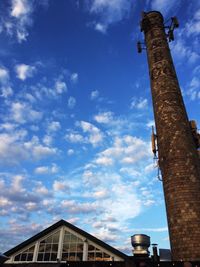 Low angle view of built structure against blue sky