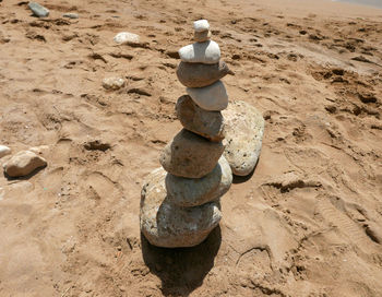 High angle view of stones on sand