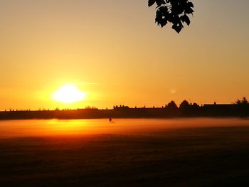 Scenic view of silhouette landscape against sky during sunset