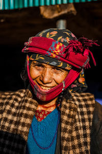 Close-up portrait of a smiling old woman