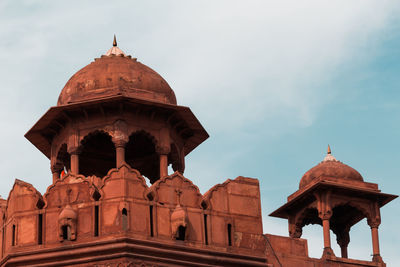 Low angle view of old building against sky