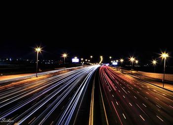 Light trails on road at night