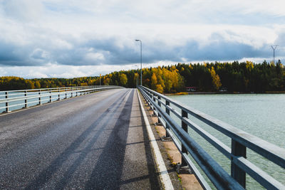 Empty road against sky in autumn