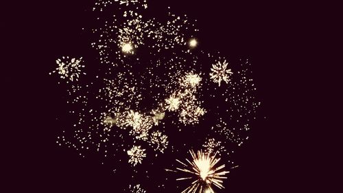 Firework display at night