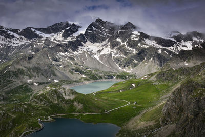 Scenic view of snowcapped mountains against sky