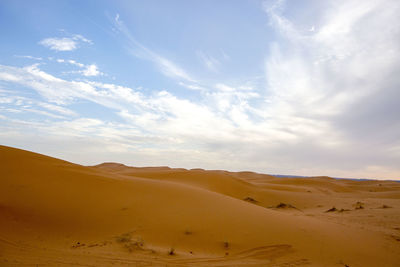 Scenic view of desert against sky