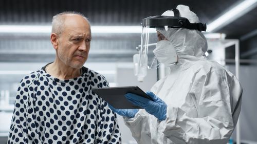 Portrait of young man using mobile phone