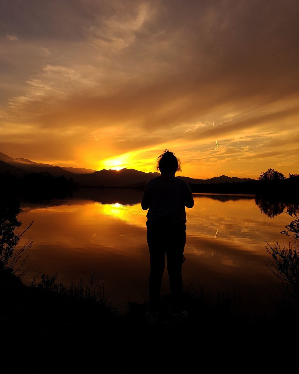 silhouette, sunset, one person, reflection, rear view, full length, men, one man only, nature, sky, water, lake, beauty in nature, cloud - sky, outdoors, standing, people, only men, adult, scenics, adults only