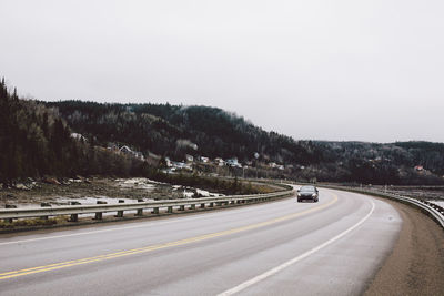 Road against sky during winter