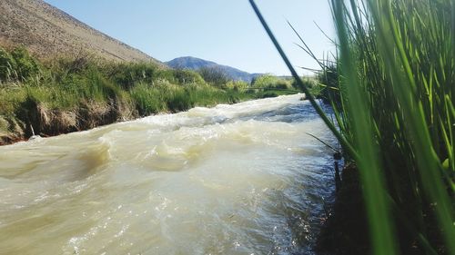 Scenic view of mountains against clear sky