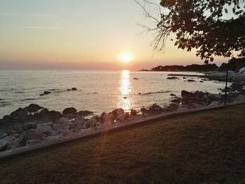 Scenic view of sea against sky during sunset