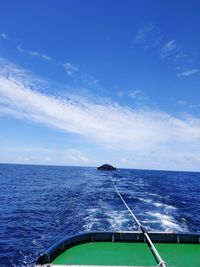 Scenic view of sea against blue sky
