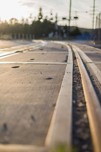 Close-up of railroad track against sky