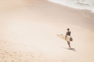 Full length of woman on beach