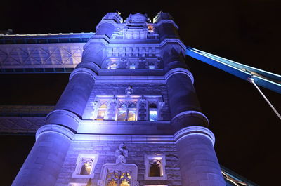 Low angle view of statue at night