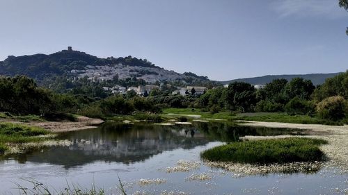 Scenic view of lake against sky