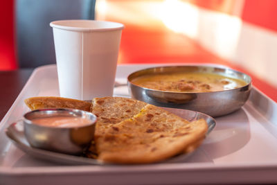 Close-up of breakfast served on table