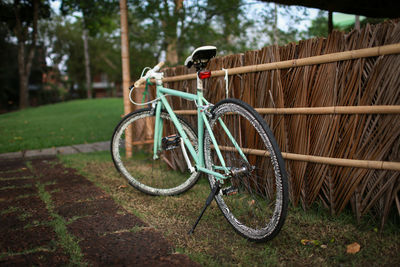 Bicycle parked on field