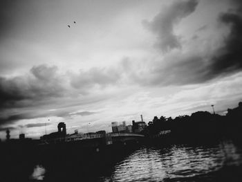 View of city against cloudy sky