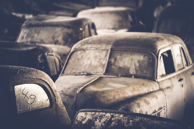 Close-up of abandoned vehicles