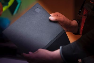 Close-up of hand holding book