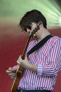 Midsection of man playing outdoors