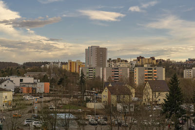 High angle view of buildings in city against sky