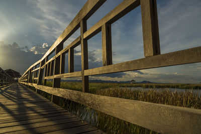 Footbridge against sky