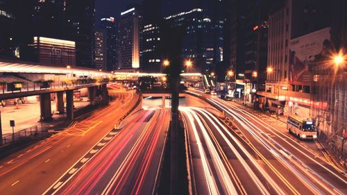 High angle view of light trails on road at night