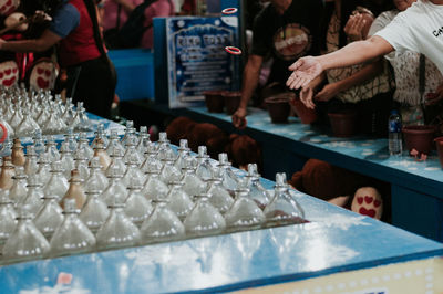 Group of people at market stall