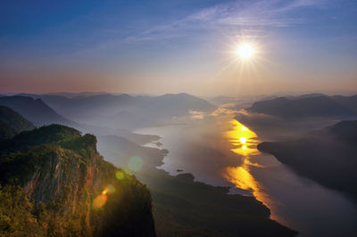 Scenic view of mountains against sky during sunset