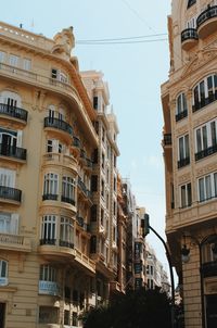 Low angle view of buildings against clear sky