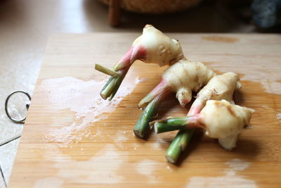 High angle view of vegetables on cutting board