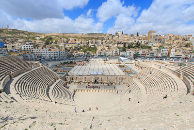 Roman theater against cloudy sky